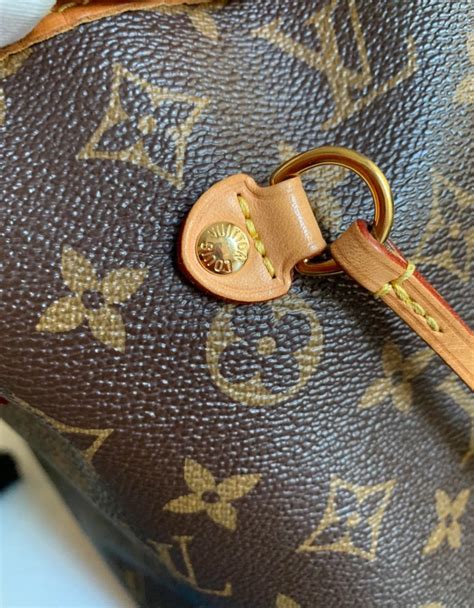 spot fake louis vuitton coin pouch|used louis vuitton pochette.